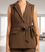 Brown sleeveless blazer with a belt on a white background