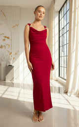 Woman wearing a red dress on a white background